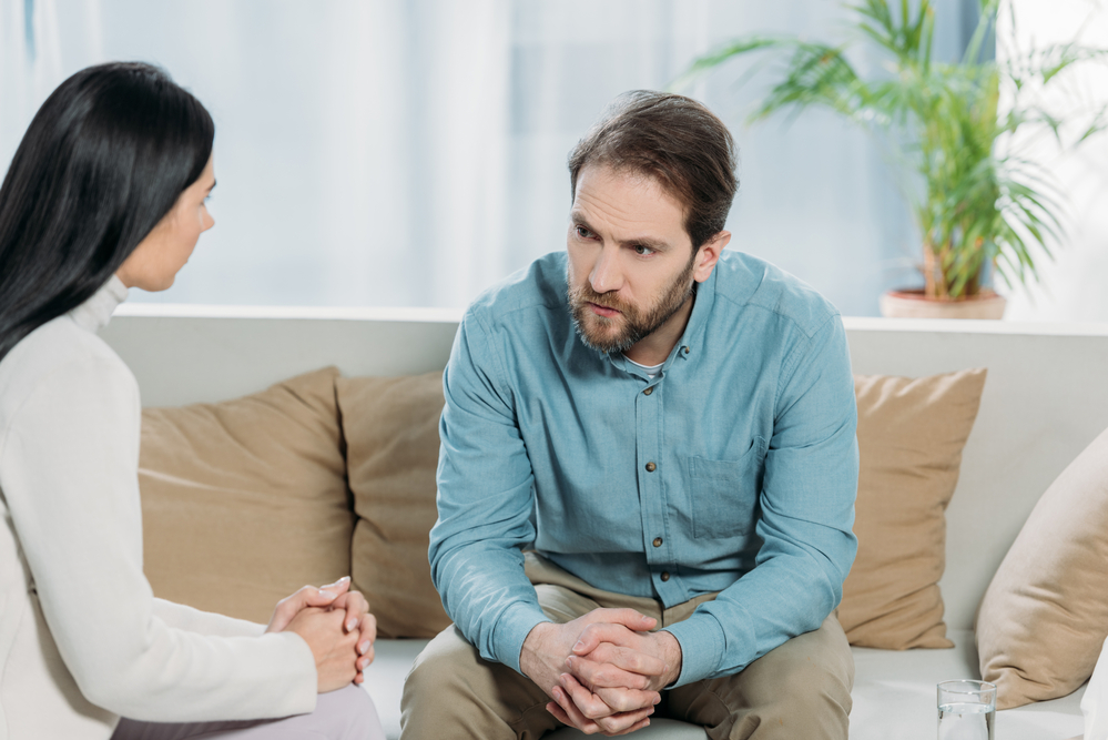 The psychotherapist consulting patient during rehab therapy
