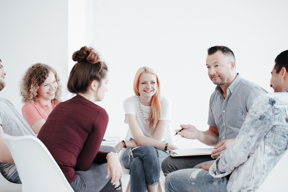 Group addiction people during psychotherapy with professional therapist